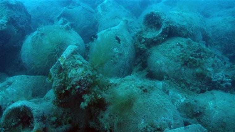 View made available Monday Aug 22 2011 of the amphora found by an US-Albanian underwater expedition which believes they have found a 1st century B.C. Roman shipwreck off the southwestern Albanian coast allegedly involved in the wine transport in the ancient times. The underwater survey headed by the Key West, Fla.-based RPM Nautical Foundation found the 'well-preserved' 30-meter (yard) tall ship and some 300 Lambolie 2-type amphora close to the Sazan Island off the Karaburun Peninsula and the Vlora city, 87 miles (140 kilometers) southwest of capital Tirana. (AP Photo)